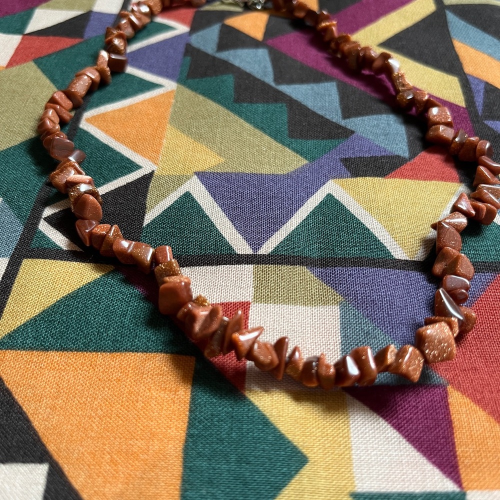 Necklace made of stones Goldstone